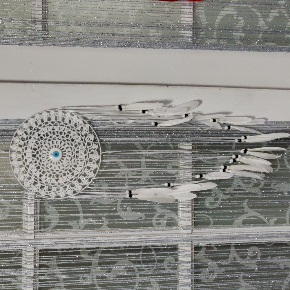 Dream catcher evil eye white and black. Dream catcher.is 8inches by 8 Inches